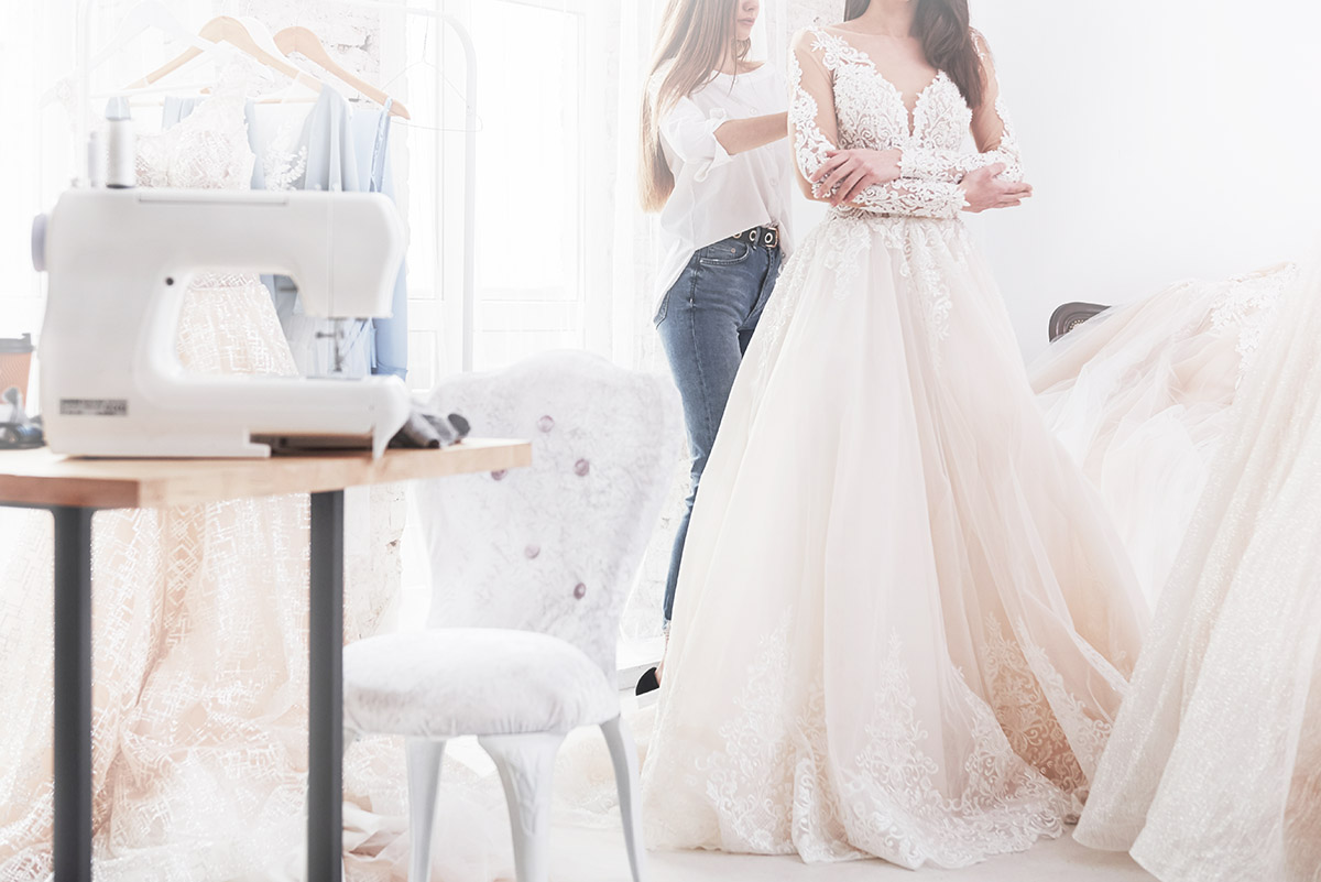Everything You Need To Know About Wedding Dress Alterations & Fittings